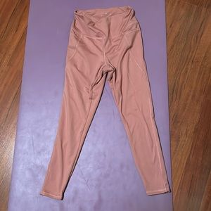 Rose pink leggings from Danskin. They are a size medium.